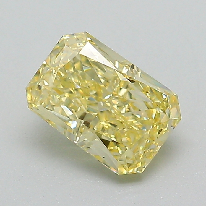 learn about 4c's of diamond 55 Fancy yellow diamond showcasing vivid golden hue and radiant sparkle in fine jewelry setting